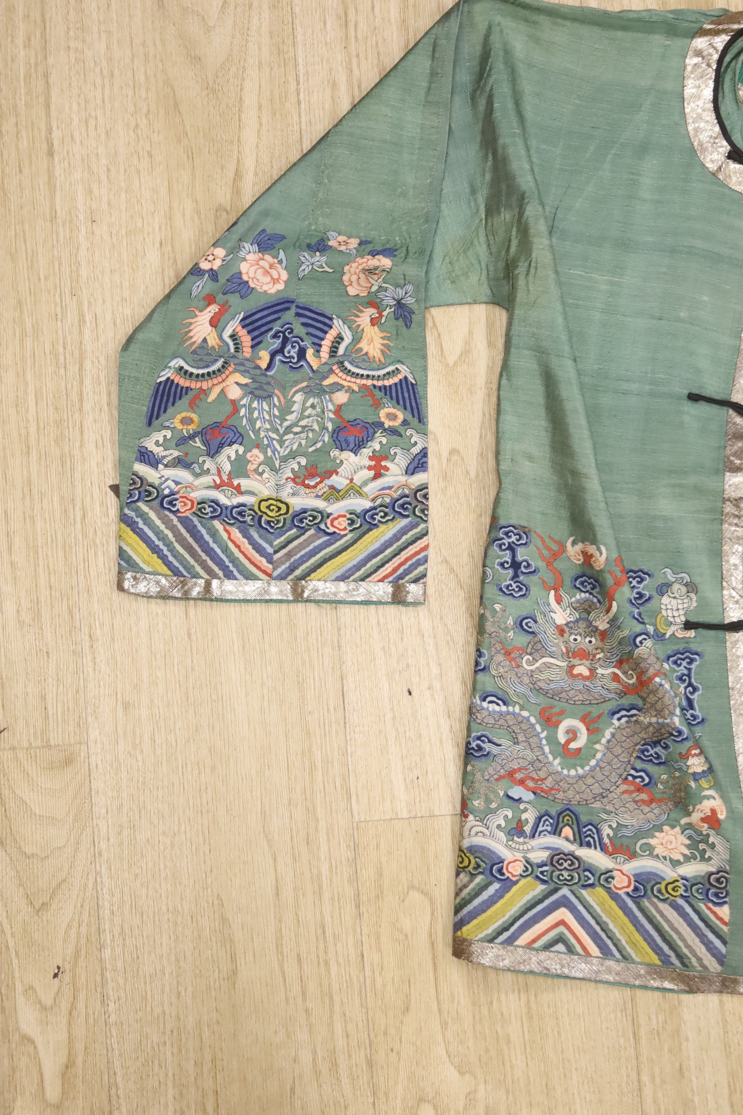 A Chinese Kesi ‘dragon’ jacket, late Qing dynasty, alterations and some wear